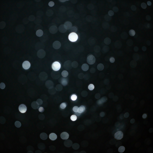 Macro shot of shimmering ethereal light particles in dark void